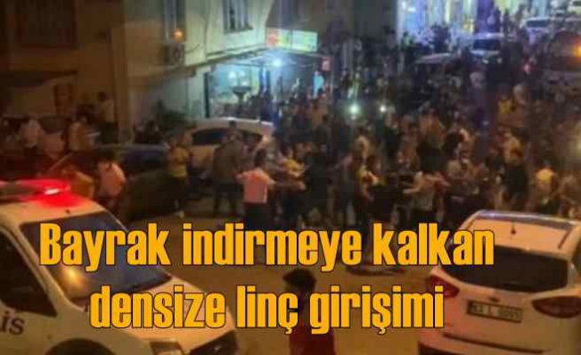Türk bayrağını indirmeye kalktı, linçten polis kurtardı