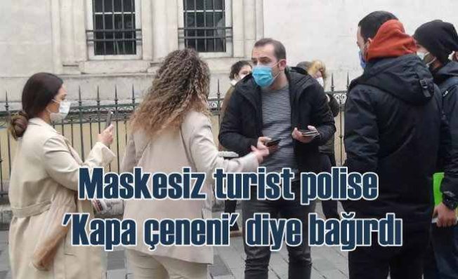 Maske takmayan turist, polise hakaret etti