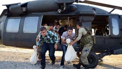 Oy pusulaları için askeri helikopterler havalandı
