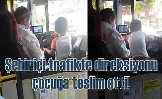 Trafikte yolcu otobüsünü çocuğa kullandırdı