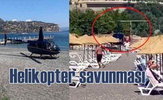 Plaja inen helikopter için işletme sahibinden savunma