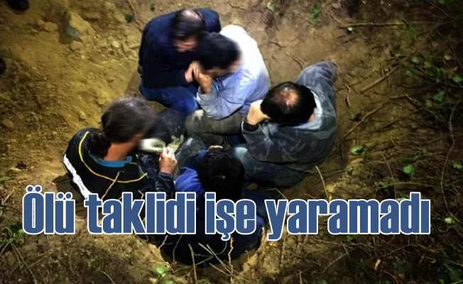 Ölü taklidi yapan defineciyi polis uyandırdı