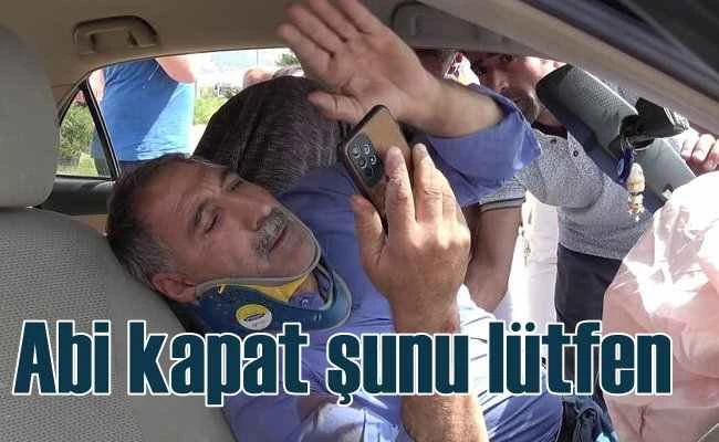 Kazada yaralandı, elinden telefonu bir türlü bırakmadı